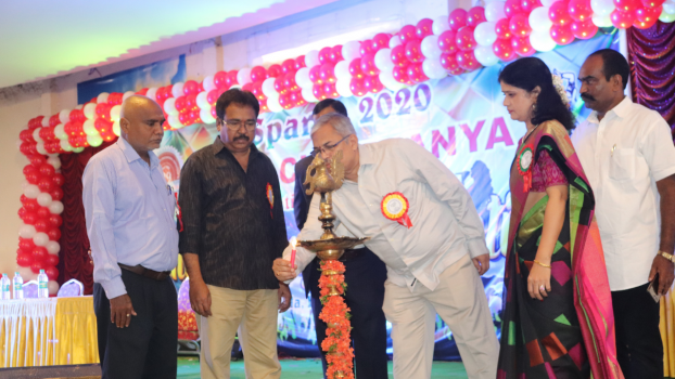 Director lighting lamps in a function at Nava Chaithanya